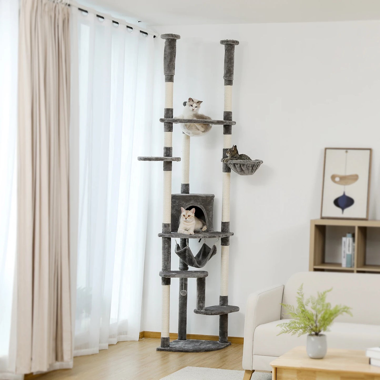 Floor to Ceiling Cat Tree with Scratching Posts and a Hammock for Indoor Cats with Toys.